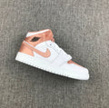 Women's Jordan 1 Mid Rose Gold Silk Sneakers 555112-190 - product image from the listing.