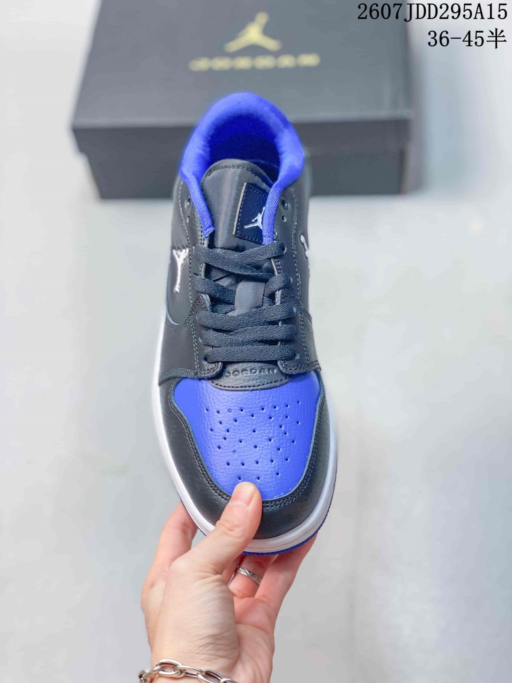 Air Jordan 1 Low Sneakers Black Blue 2607JDD295A15 - product image from the listing.