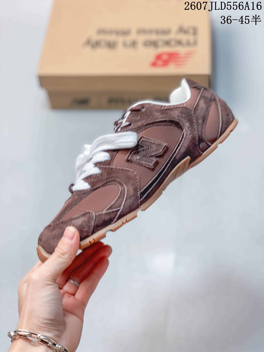 Miu Miu x New Balance 530 SL Sneakers in Brown 2607JLD556A16 - product image from the listing.