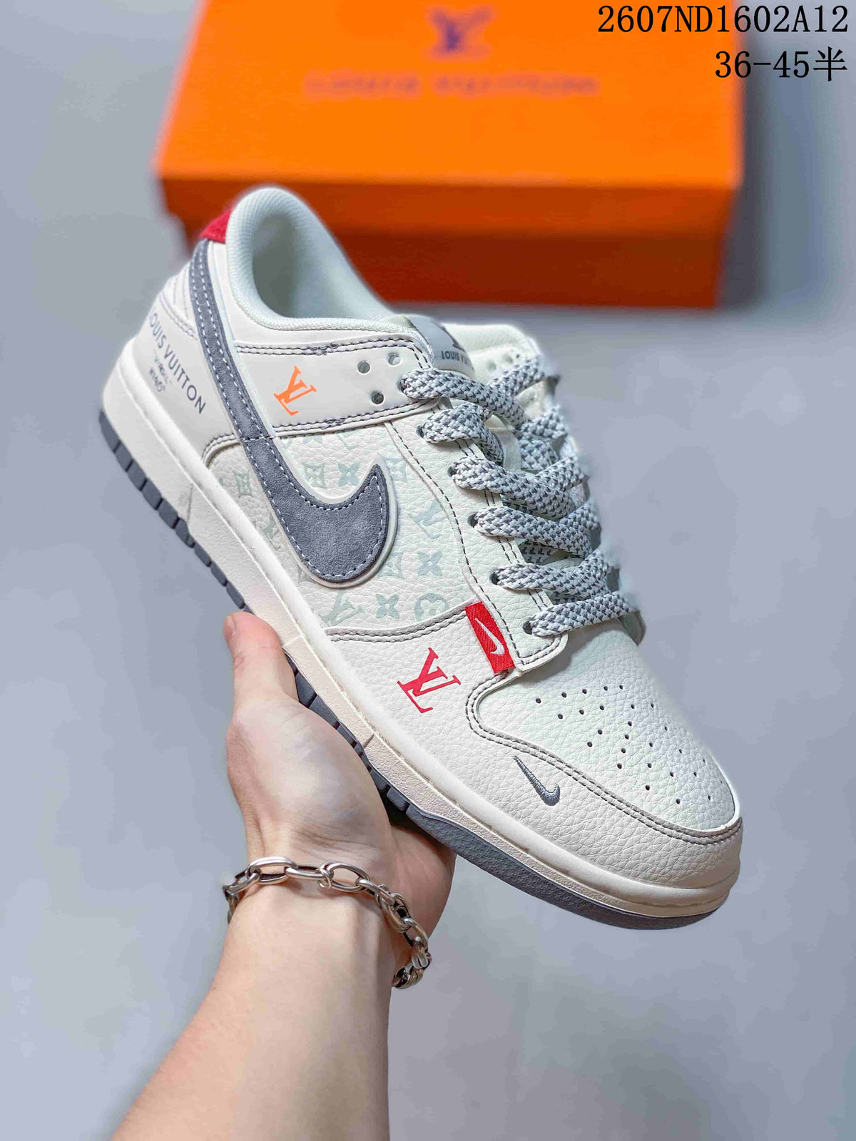 Nike SB Dunk Low Sneakers in White Gray Red 2607ND1602A12 - product image from the listing.