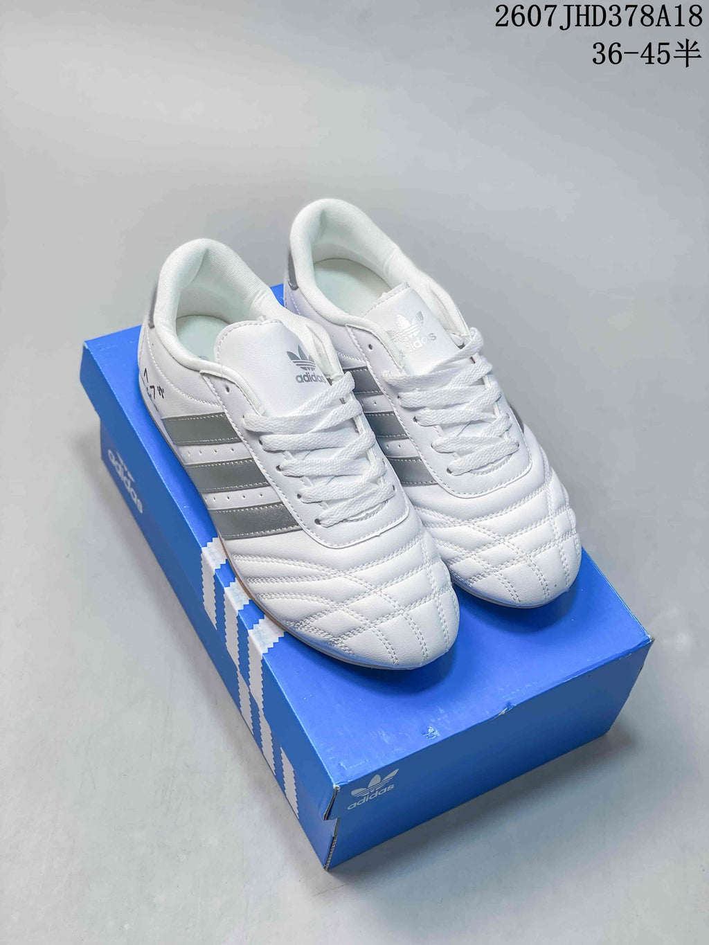 adidas Taekwondo SMIL-LS Low-Top Sneakers in White Silver - product image from the listing.