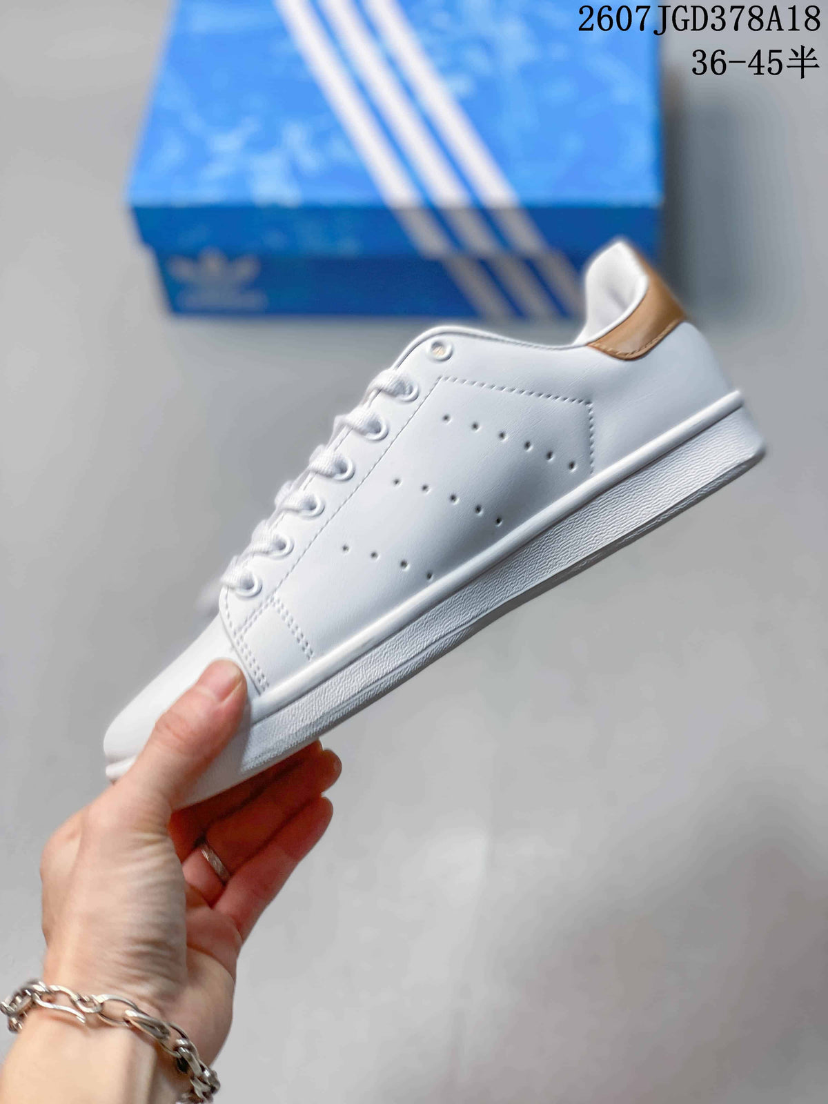 Adidas Stan Smith Sneakers in White Gold 711280WYQ - product image from the listing.