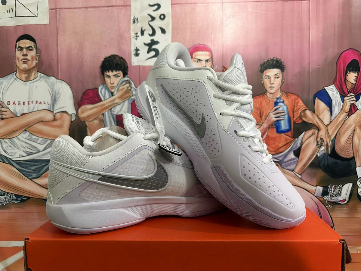 White and Purple Nike Basketball Shoes - product image from the listing.