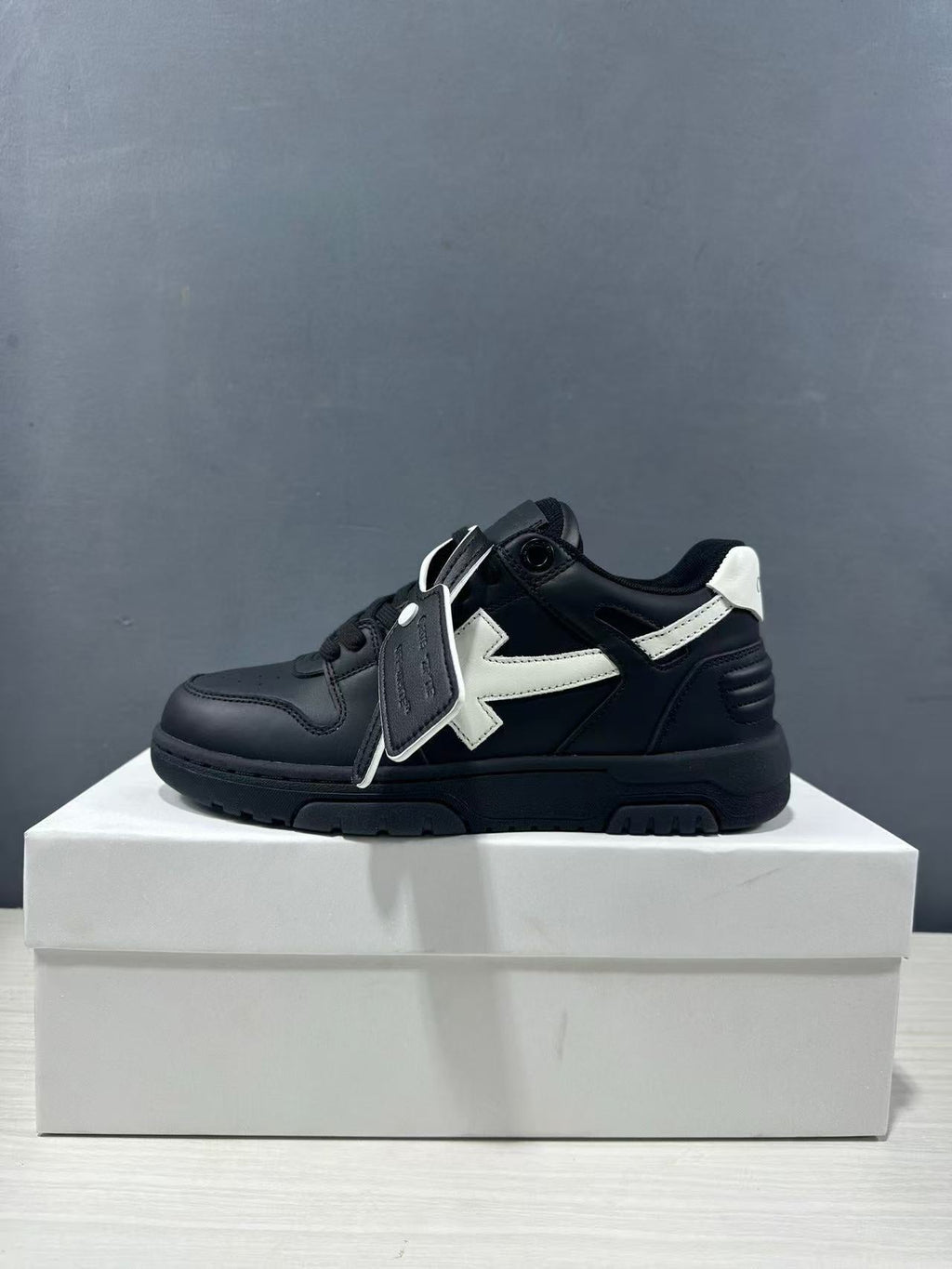 Off-White Out Of Office Low-Top Sneakers in Black White OMAI89C99LEA0191001 - product image from the listing.