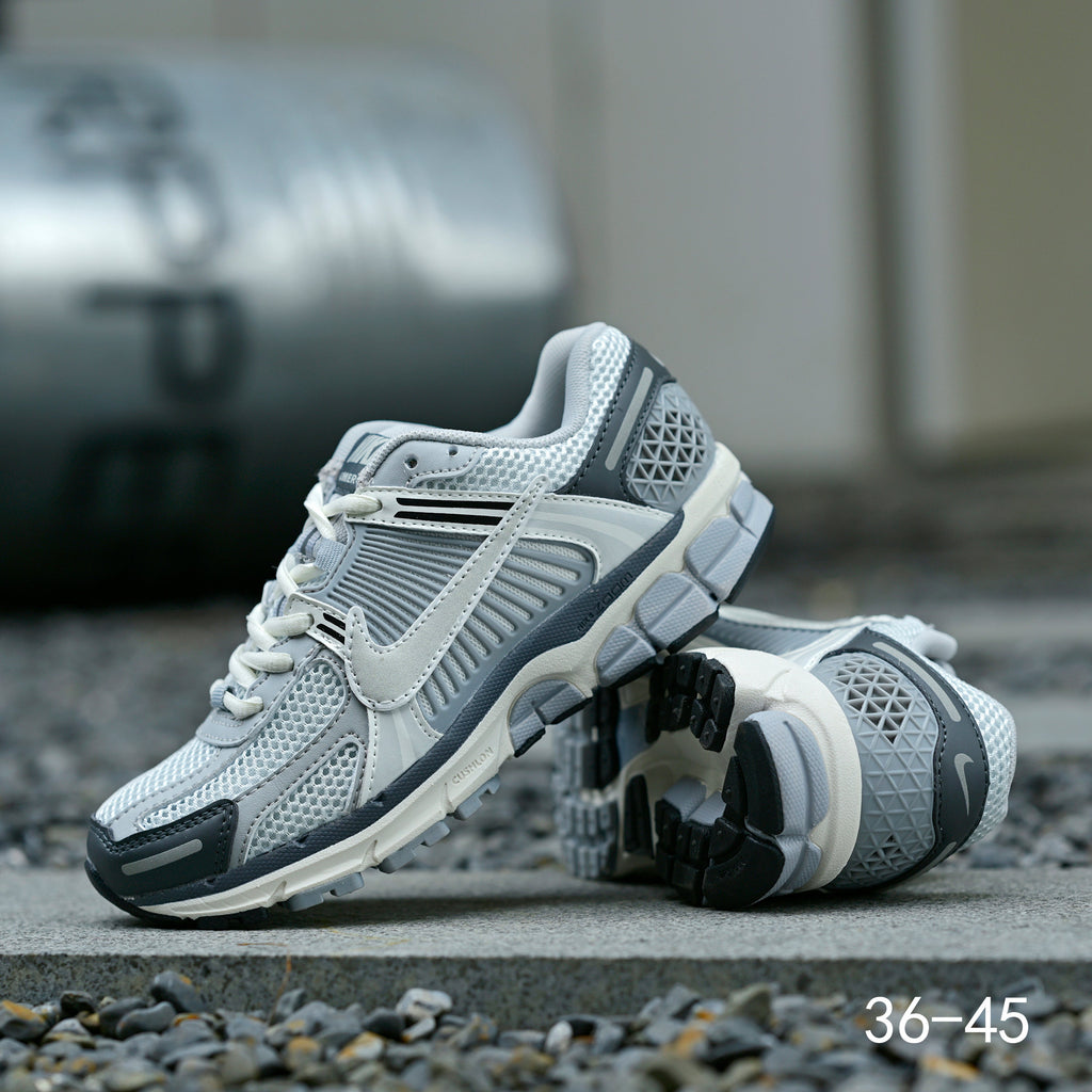 Light Gray and Navy Nike Air Zoom Vomero 5 Sneakers - product image from the listing.