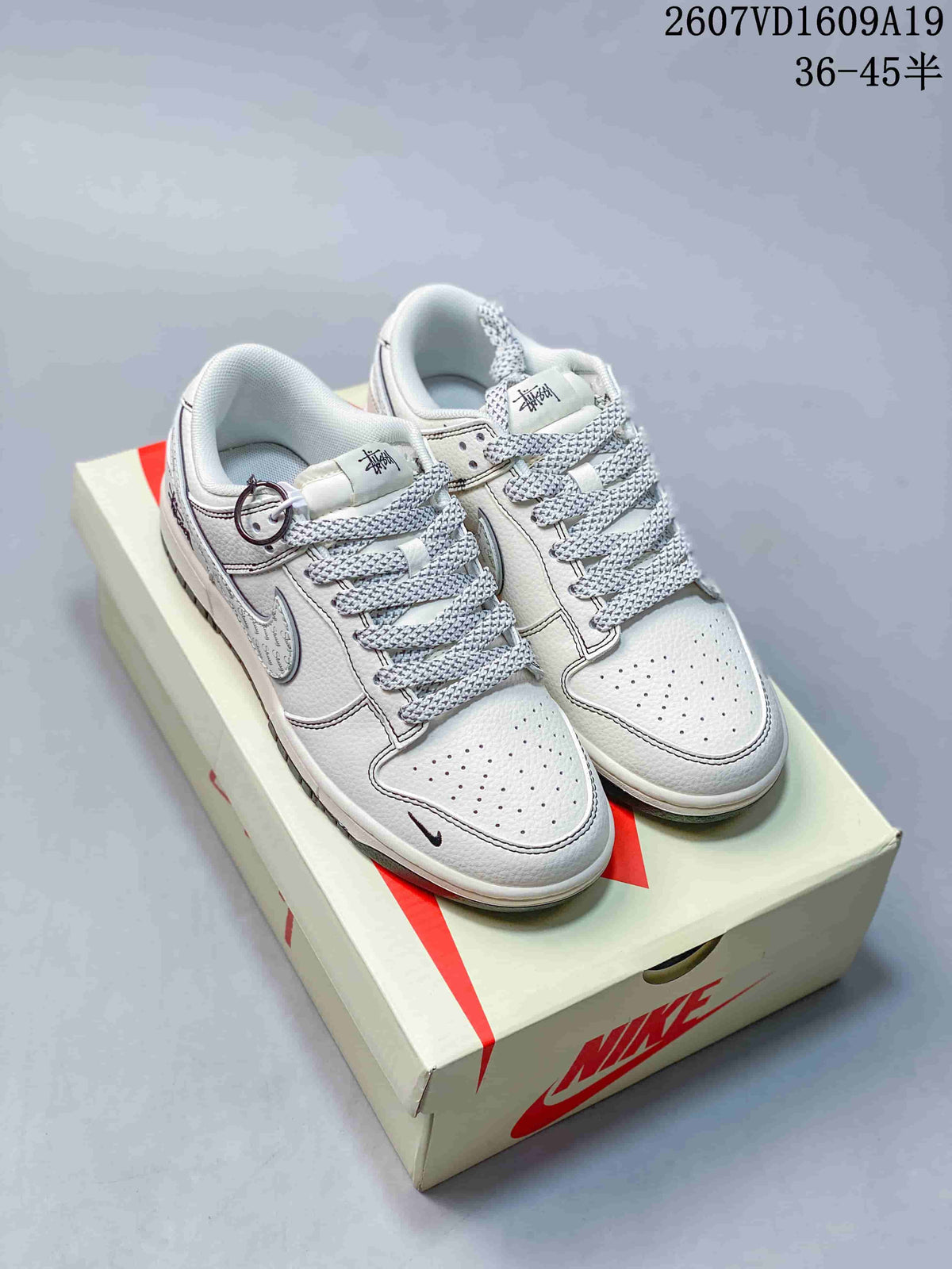 Nike Dunk Low Retro Sneakers in White Navy 2607VD1609A19 - product image from the listing.