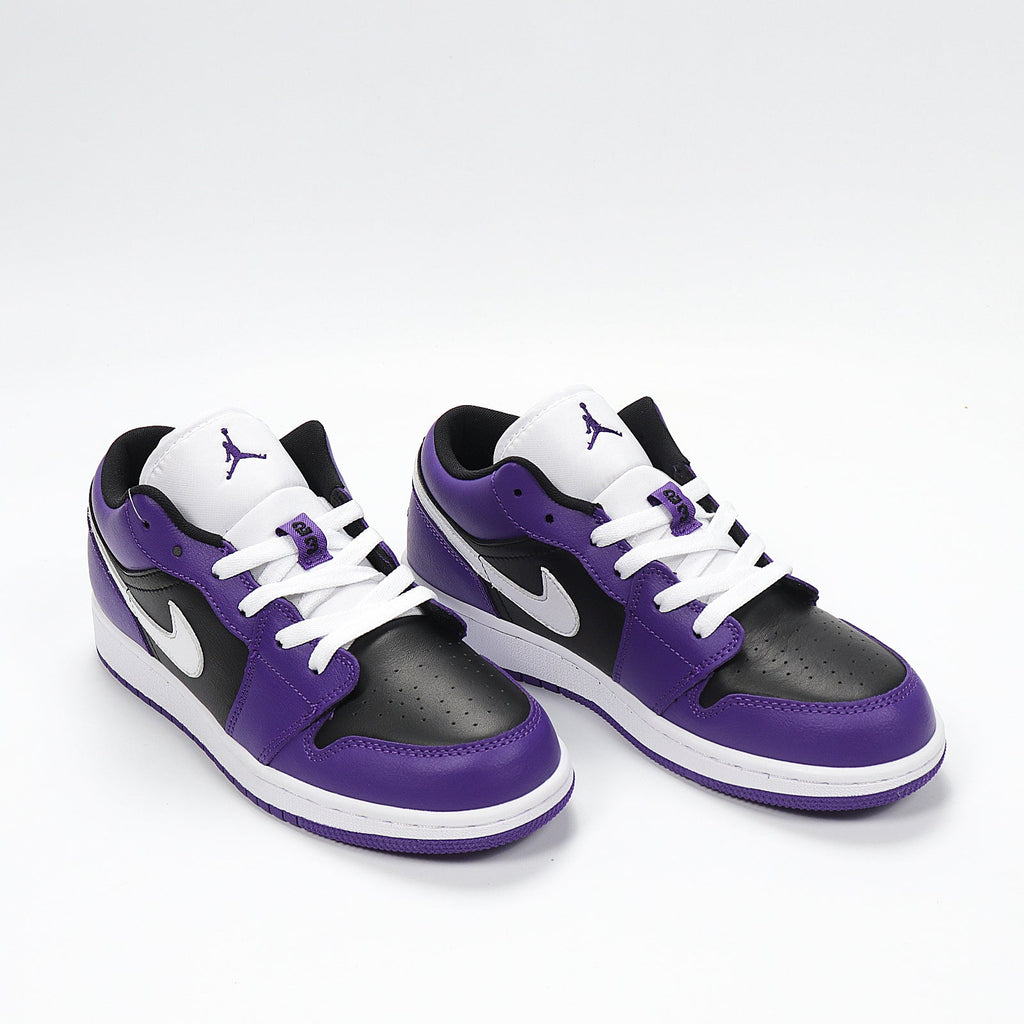 Jordan 1 Low Sneakers in Black Purple White 553560-501 - product image from the listing.