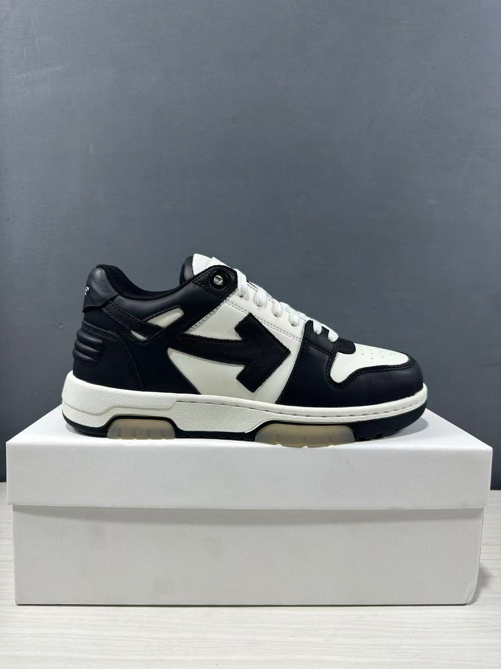 Off-White Out Of Office Low-Top Sneakers in Black White OMAI89C99LEA0070110 - product image from the listing.