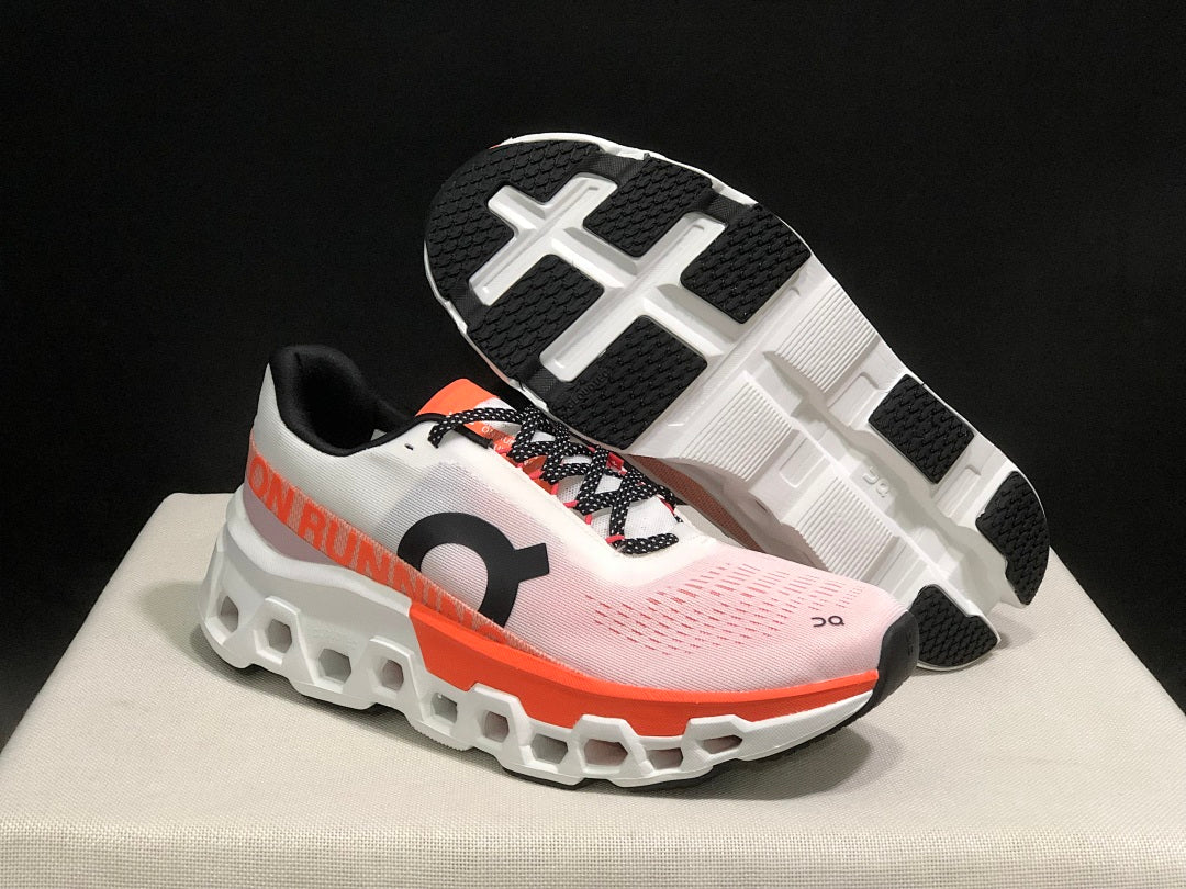 White and Orange On Cloudmonster 2 Running Shoes - product image from the listing.