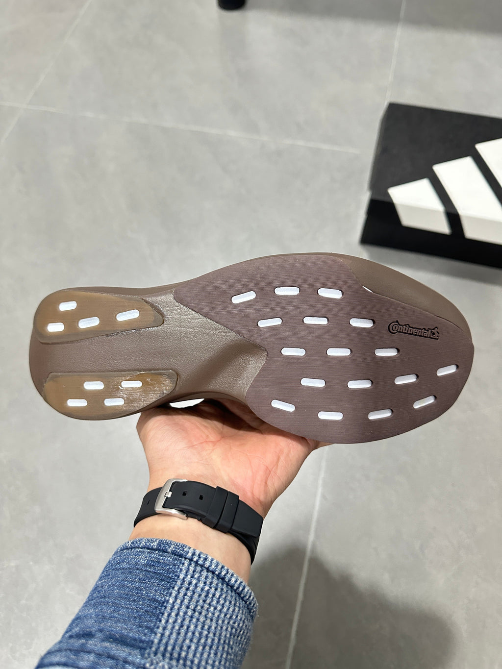 Brown and Tan Adidas Lightstrike Pro Running Shoes - product image from the listing.