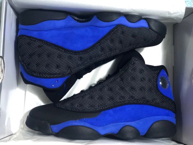 Jordan 13 Retro Sneakers Black/Royal in Blue - product image from the listing.