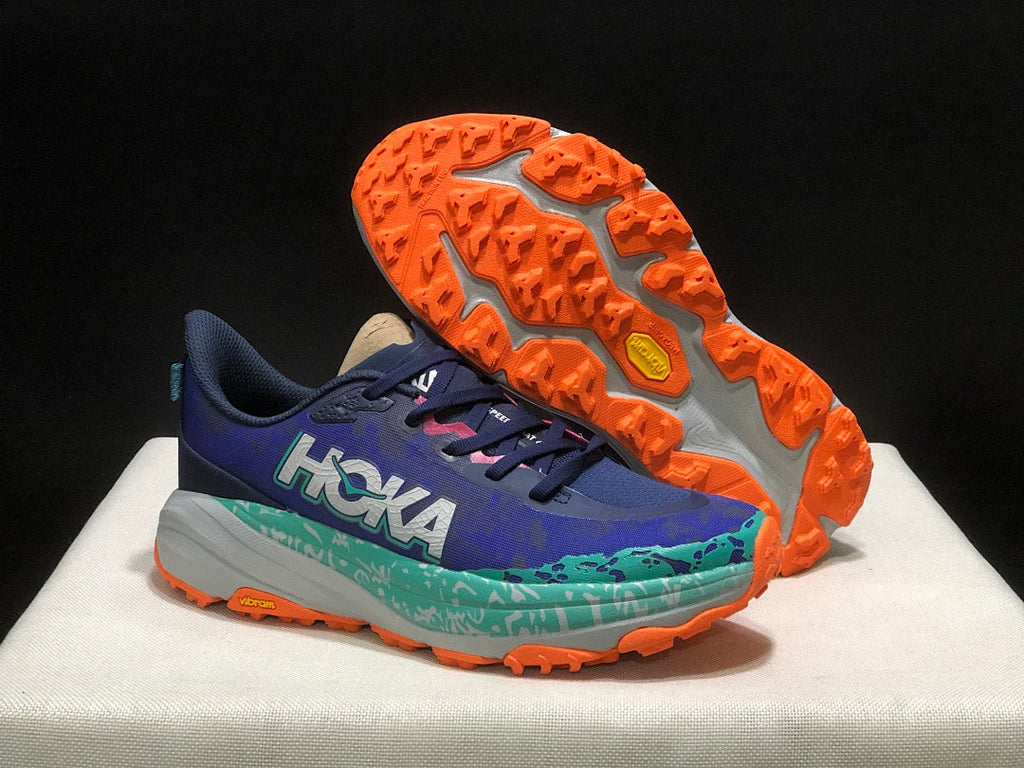 HOKA Speedgoat 6 Trail Running Shoes, in Blue and Teal - product image from the listing.