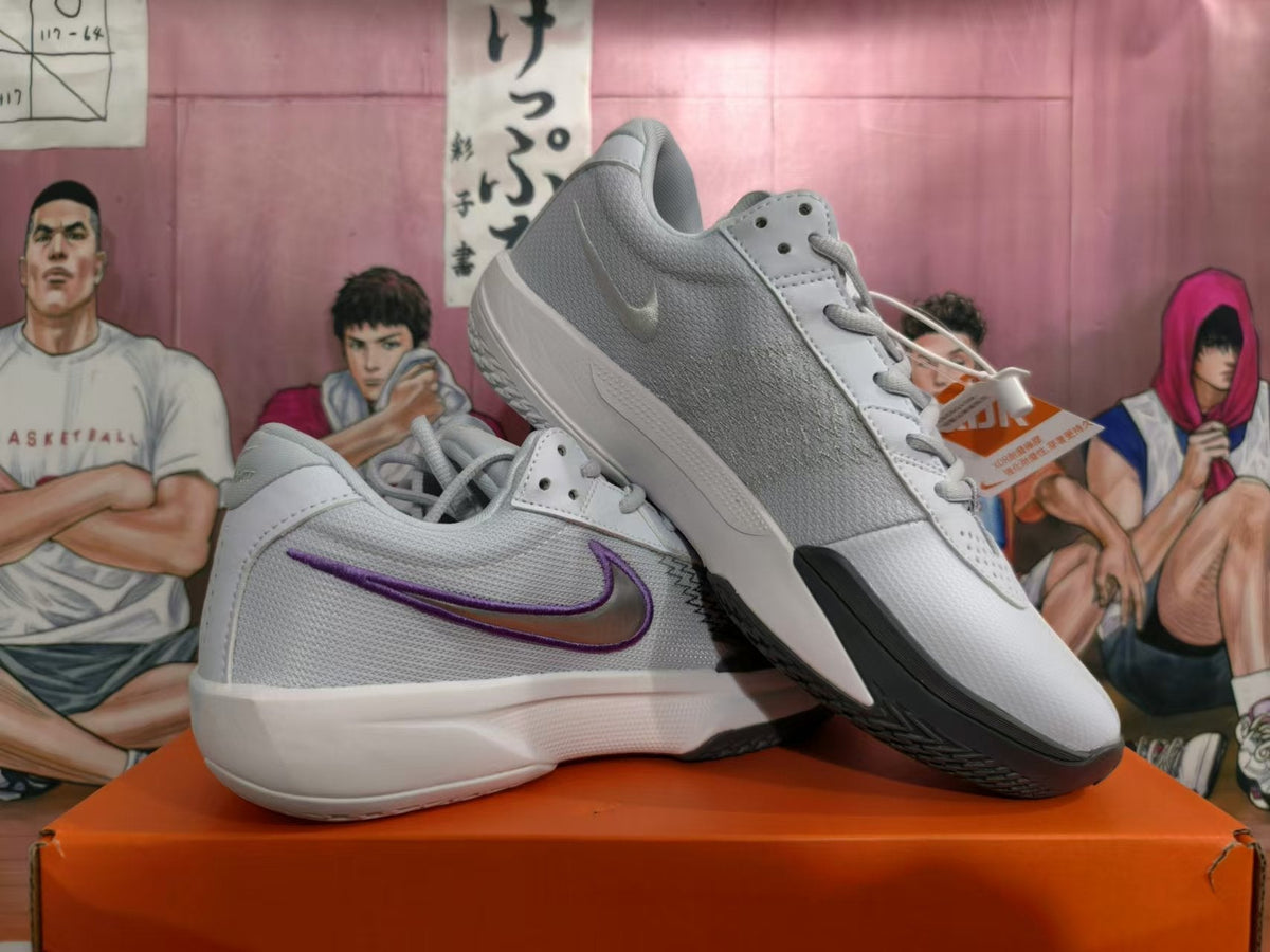 Gray and Purple Nike Giannis Immortality Basketball Shoes - product image from the listing.