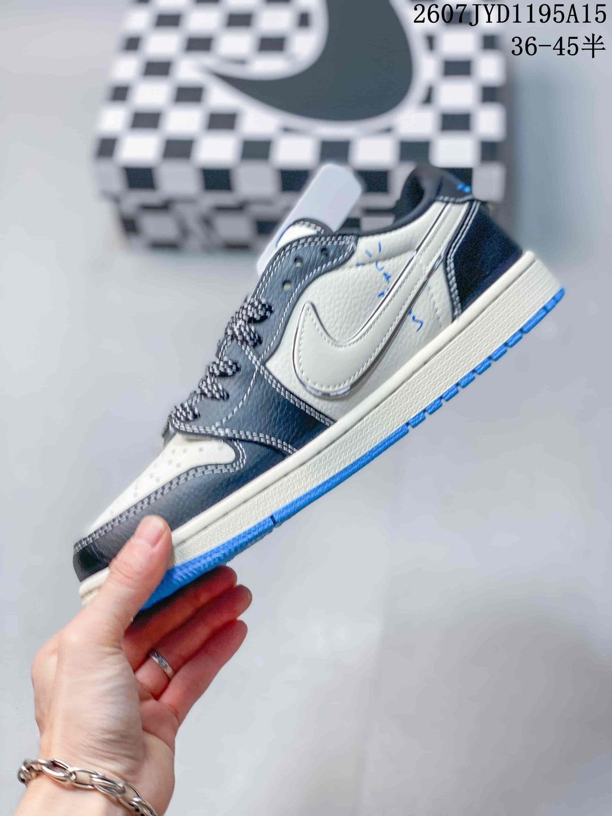 Air Jordan 1 Low White Black Blue Sneakers 2607JYD1195A15 - product image from the listing.
