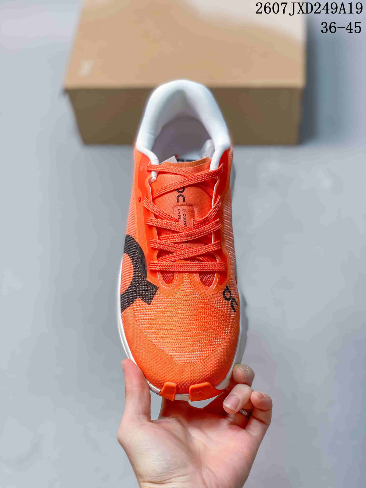 ON Cloudmonster 3 Hyper Sneakers in Orange 711490EEU - product image from the listing.