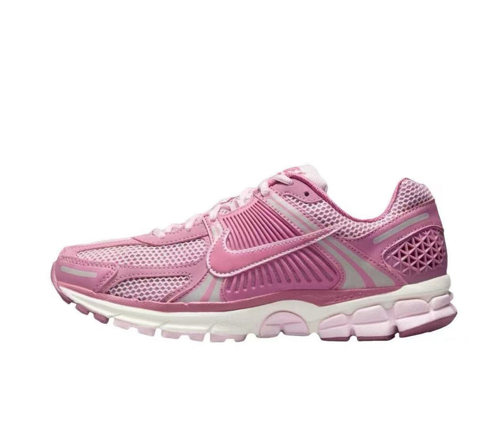 Nike Zoom Vomero 5 Sneakers in Pink and White - product image from the listing.