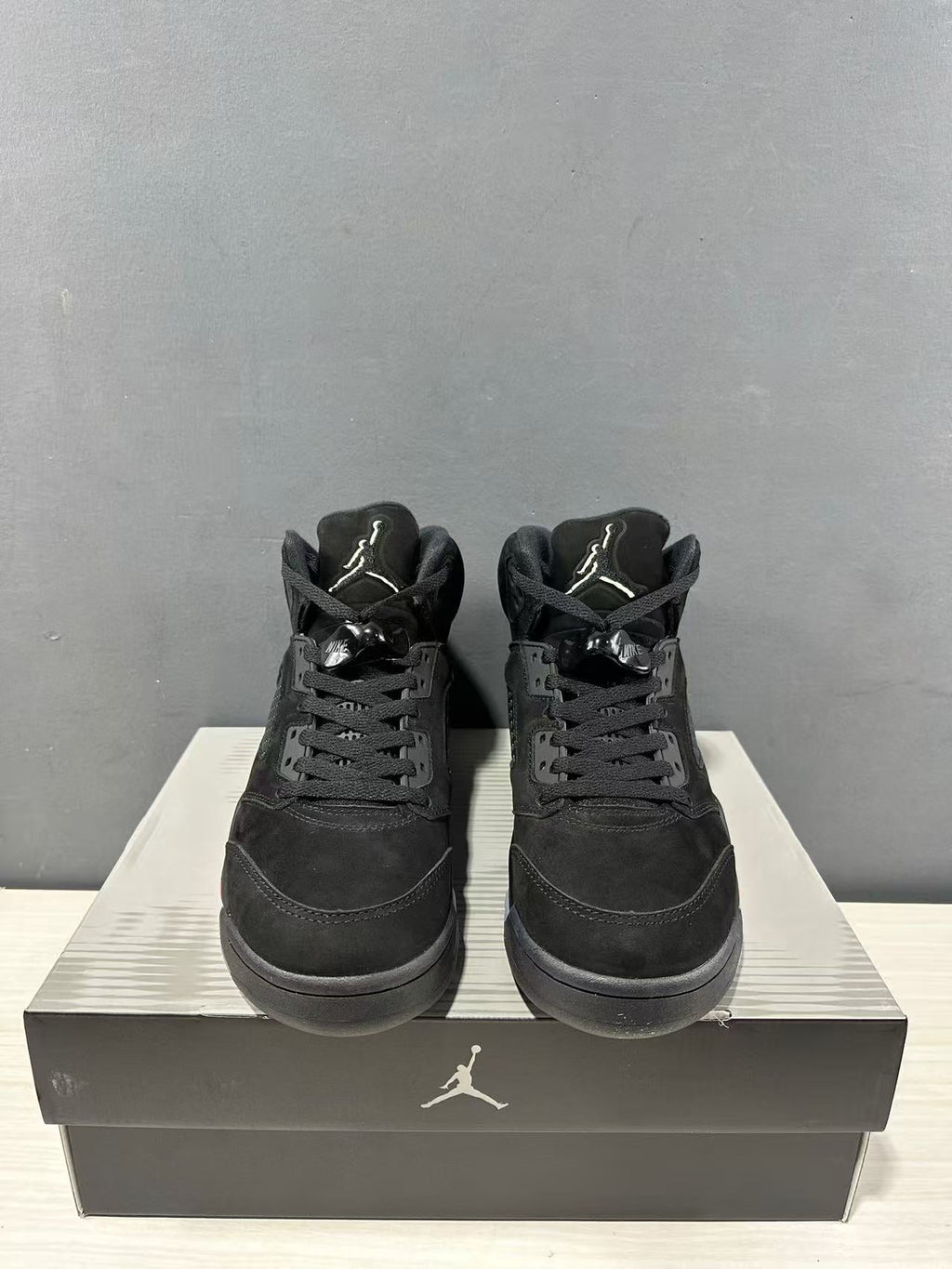 Air Jordan 5 Retro Sneakers Black and Red - product image from the listing.