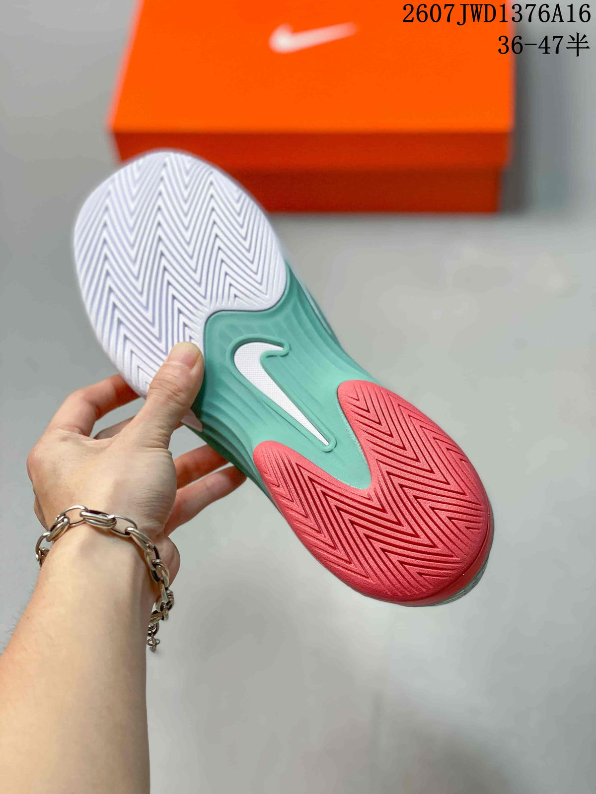 Mint Green and Coral Nike Vapor 12 Low-Top Tennis Sneakers - product image from the listing.