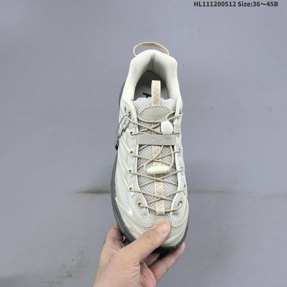HOKA Mafate Three 2 Trail Running Shoes in Cream and Gray - product image from the listing.