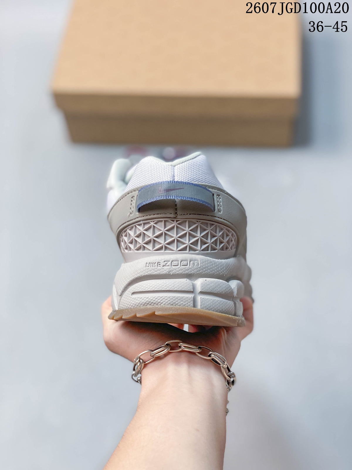 Nike Zoom Vomero Roam Sneakers in White Grey 2607TGD100A20 - product image from the listing.
