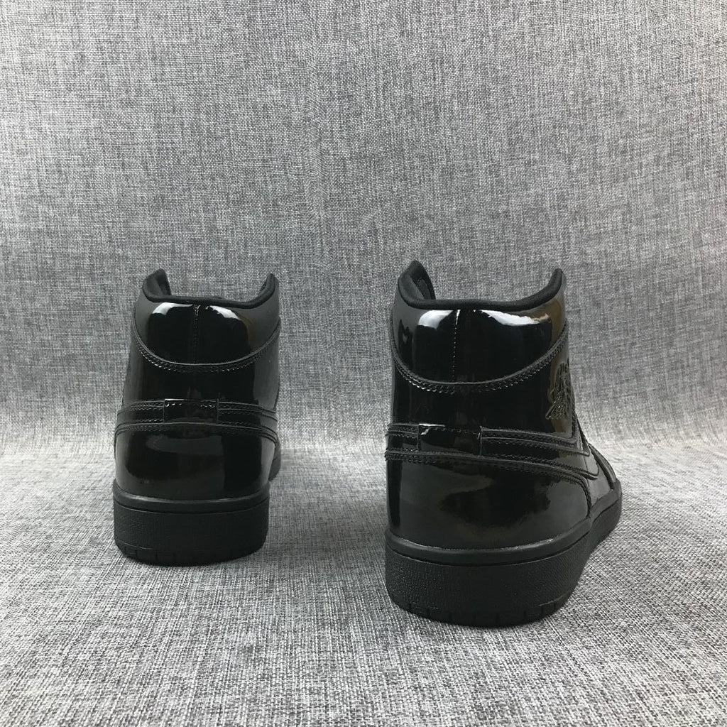 Black Patent Sneakers - Air Jordan 1 Mid BQ6472-002 - product image from the listing.