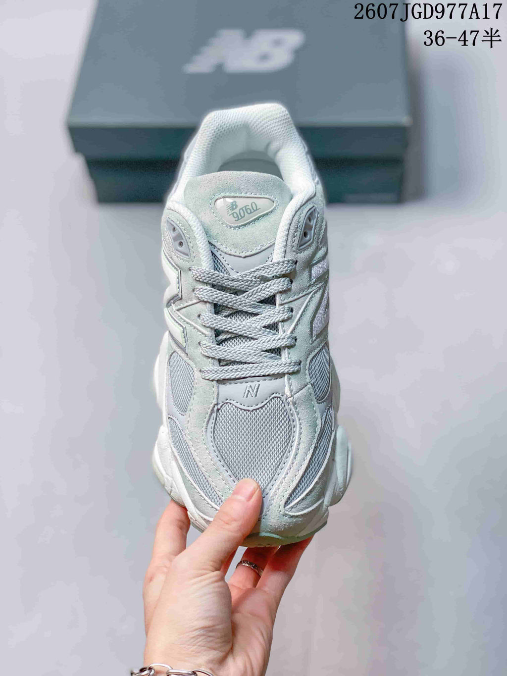 New Balance 9060 Sneakers in Mint Green and White - product image from the listing.