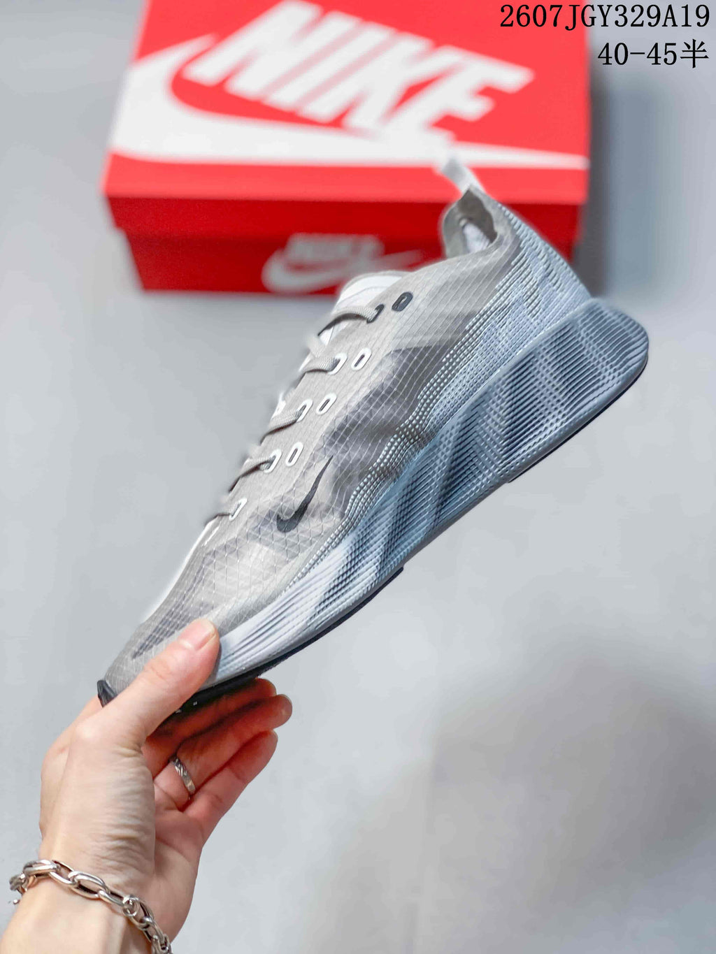 Nike Ava X Rover Low-Top Running Sneakers in Gray - product image from the listing.