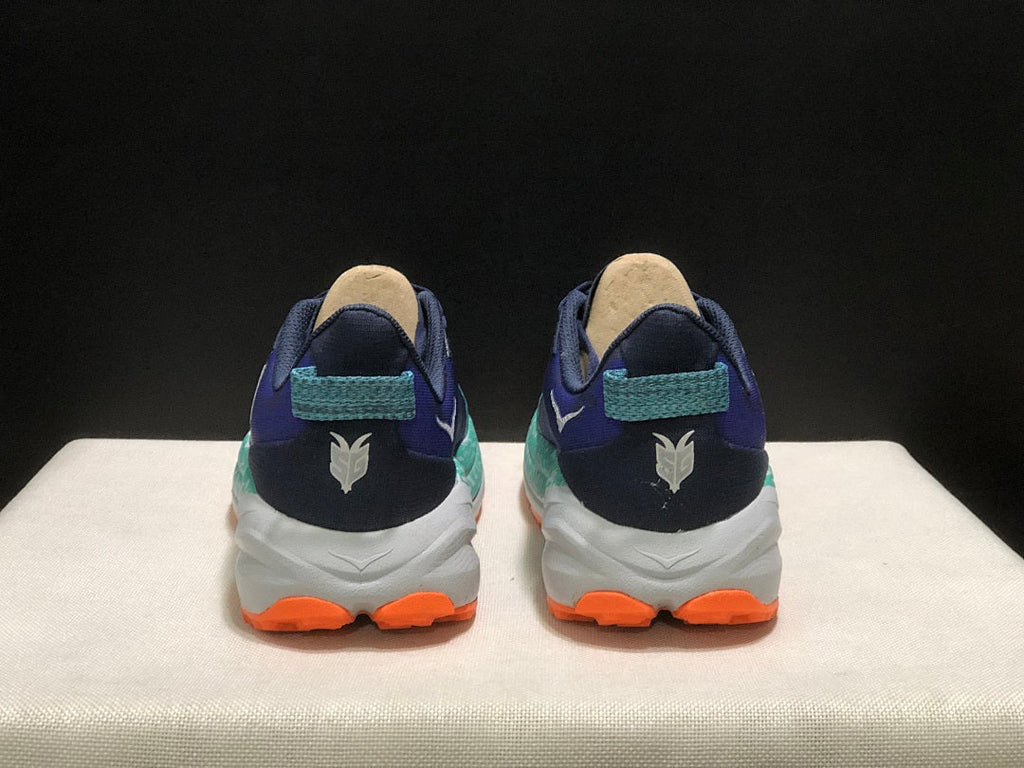 HOKA Speedgoat 6 Trail Running Shoes, in Blue and Teal - product image from the listing.