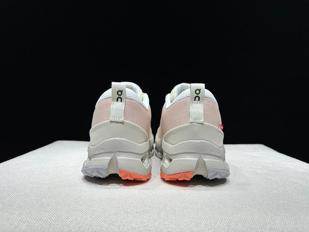 On Cloudsurfer Trail 2 Trail Running Shoes, in Ivory and Coral - product image from the listing.