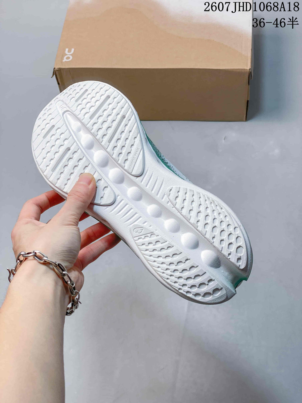 On Cloudsurfer 3 Running Sneakers in White Green 2607JHD1068A18 - product image from the listing.