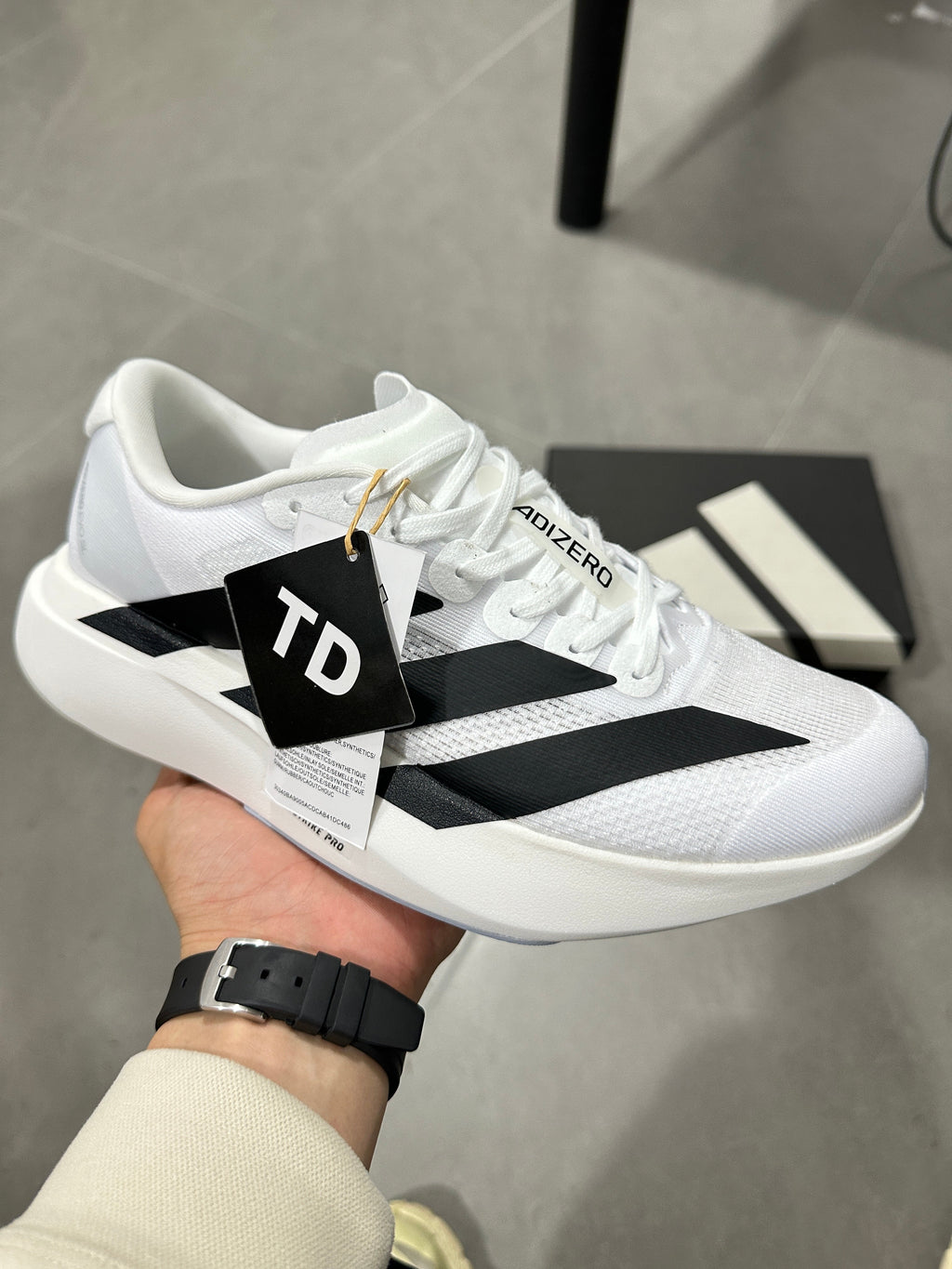 adidas Lightstrike Pro Running Shoes in White Black JH6206 - product image from the listing.
