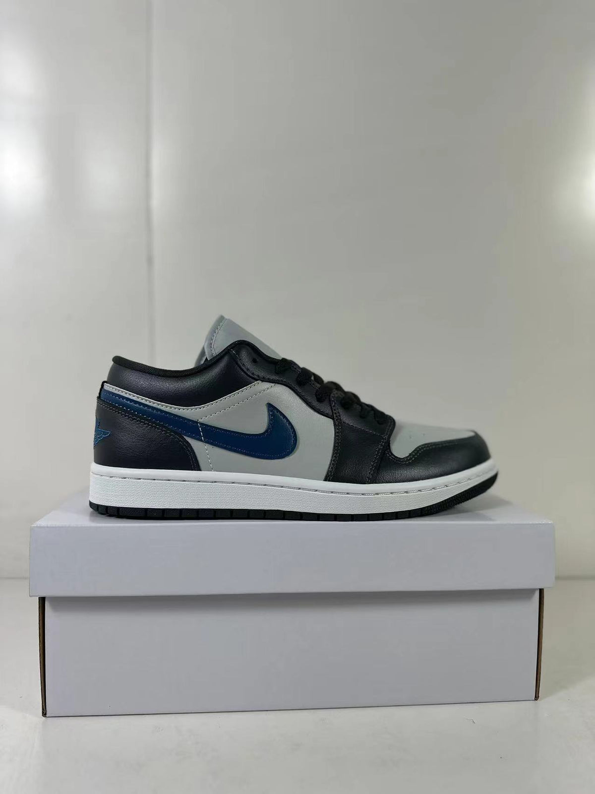 Air Jordan 1 Low Black Grey Blue DC0774-040 - product image from the listing.