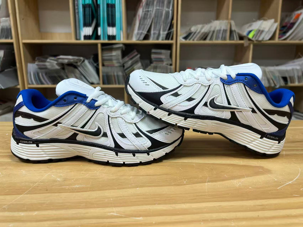 Nike P-6000 Sneakers in White Blue Black IZ4752-100 - product image from the listing.