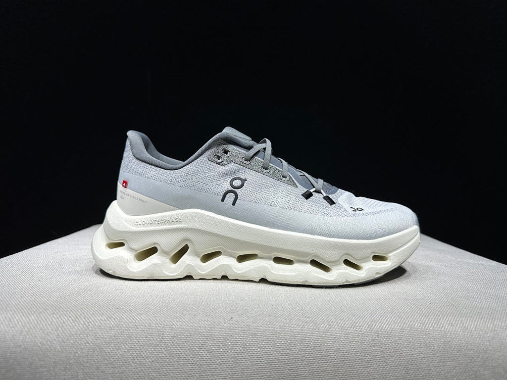 On Cloudtilt Sneakers, in Gray and White - product image from the listing.