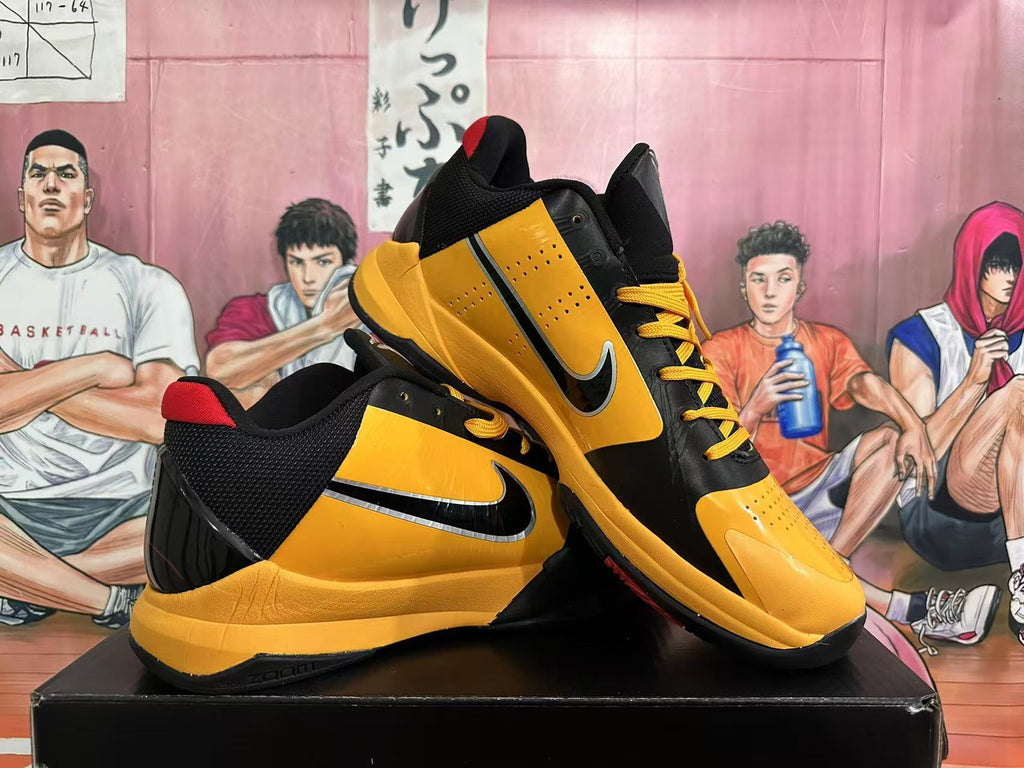 Yellow and Black Nike Kobe Basketball Shoes - product image from the listing.
