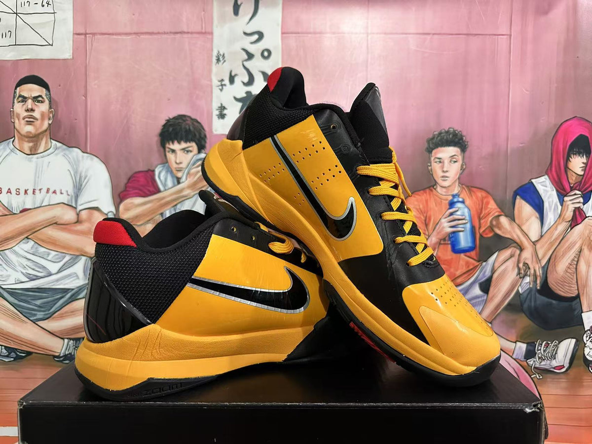 Yellow and Black Nike Kobe Basketball Shoes - product image from the listing.