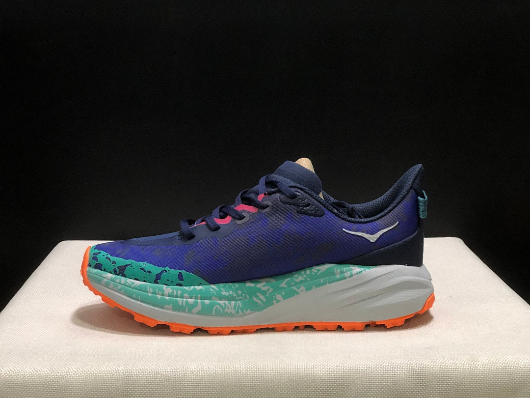 HOKA Speedgoat 6 Trail Running Shoes, in Blue and Teal - product image from the listing.