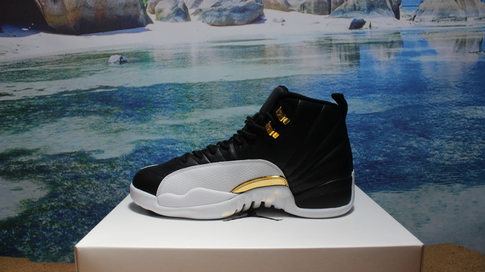 Air Jordan 12 Wings Black White Gold Sneakers 848692-033 - product image from the listing.