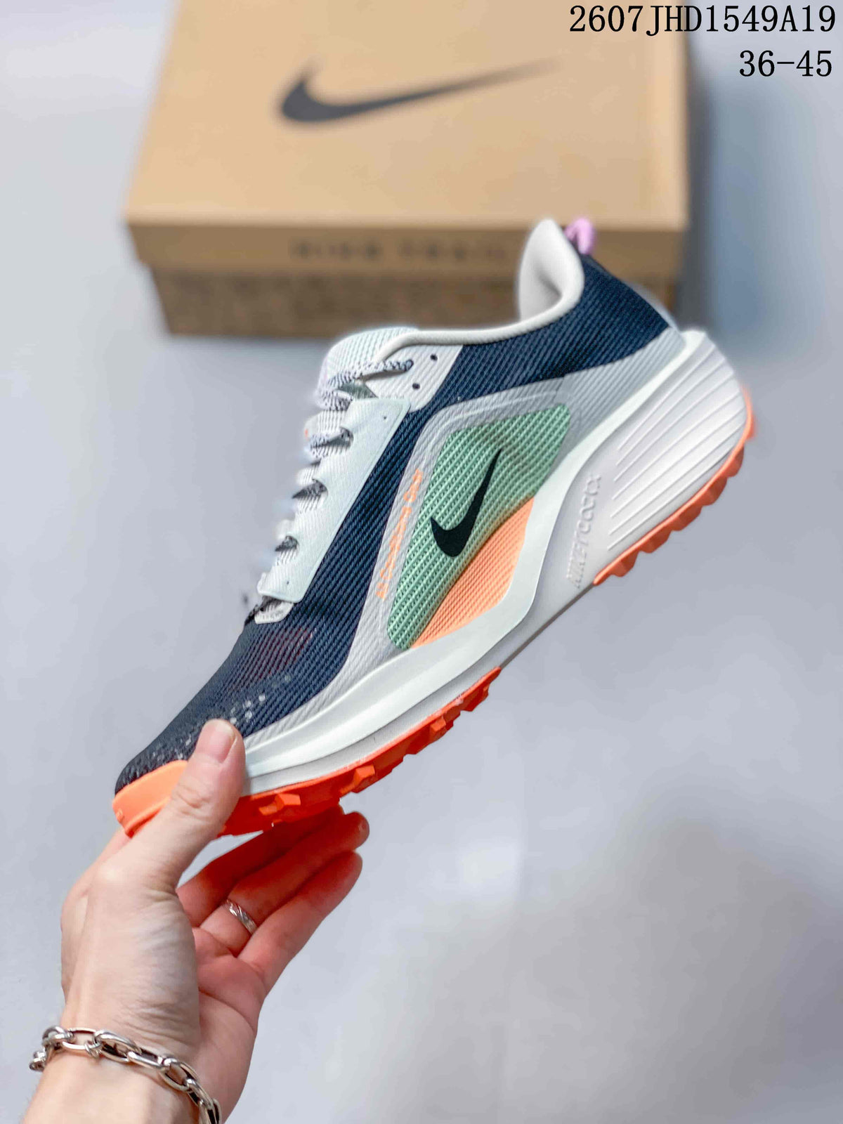 Nike Zoom Fly 5 Running Shoes in Navy White Orange - product image from the listing.