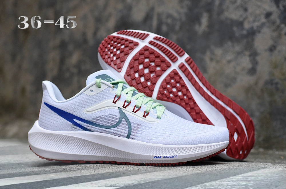 Nike Air Zoom Running Shoes in White, in Blue and Red - product image from the listing.
