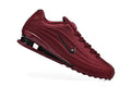 Nike Shox TL Low-Top Sneakers in Red - product image from the listing.