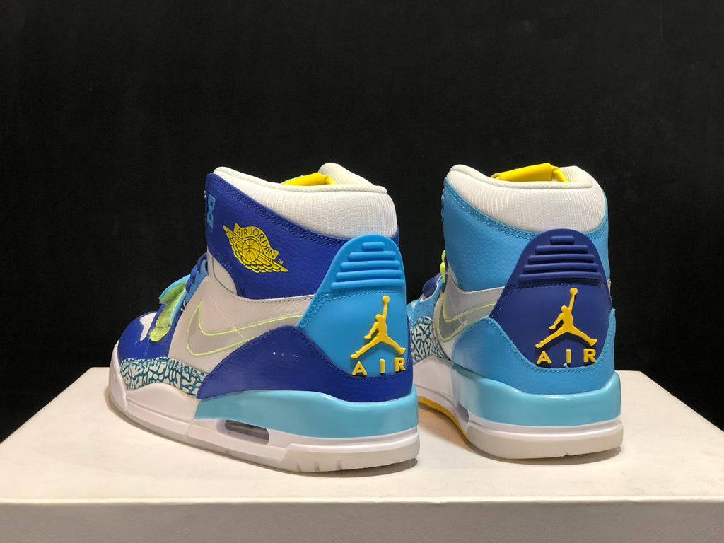 Air Jordan Legacy 312 Fly High-Top Sneakers, in White and Blue - product image from the listing.