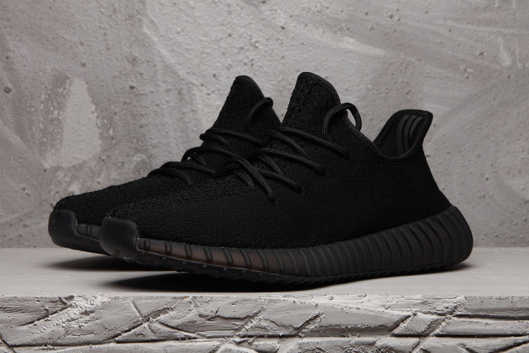 Yeezy 350 V2 Sneakers in Black Knit - product image from the listing.