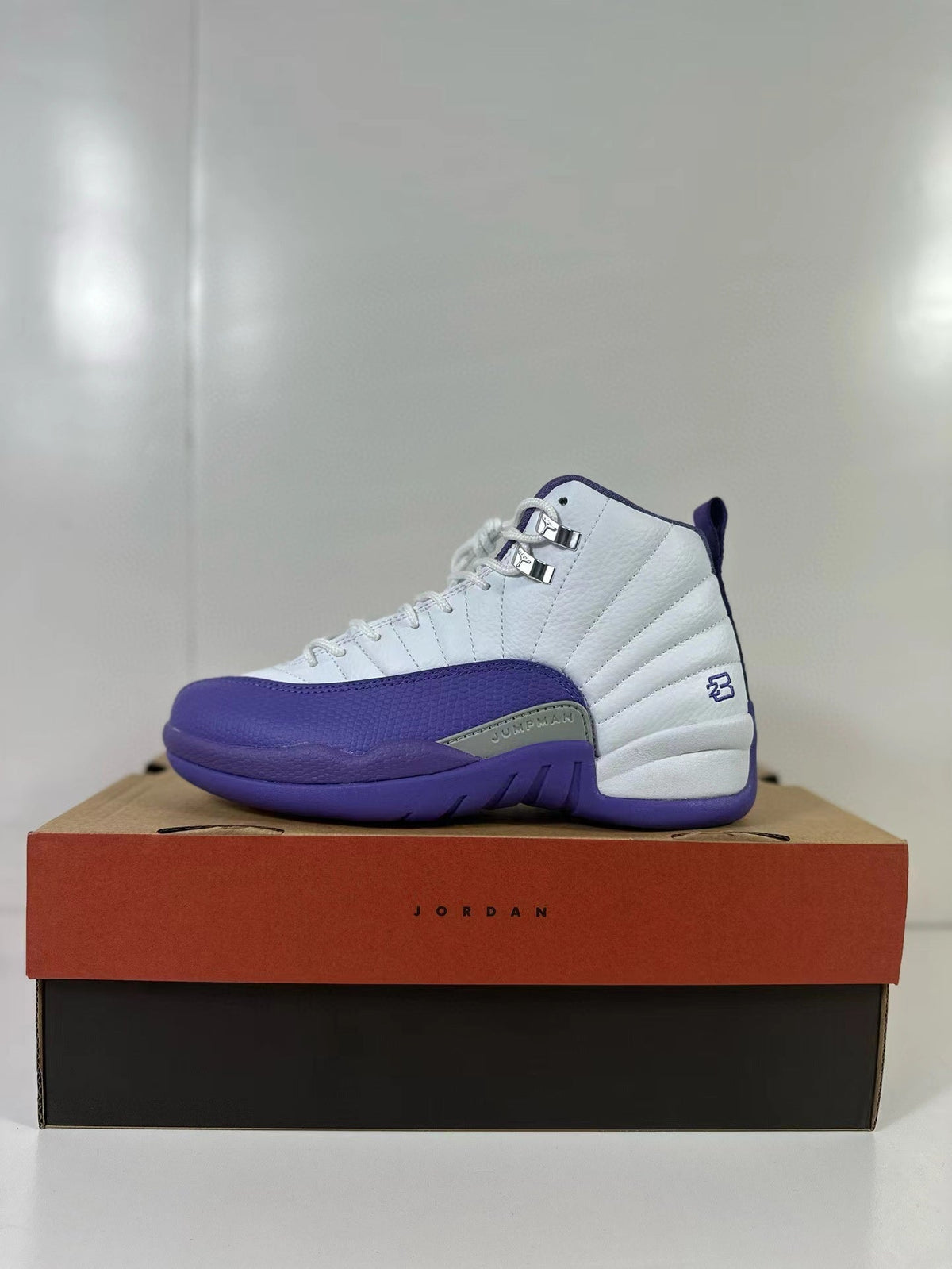 Air Jordan 12 Retro White Purple CT8013-150 Sneakers - product image from the listing.