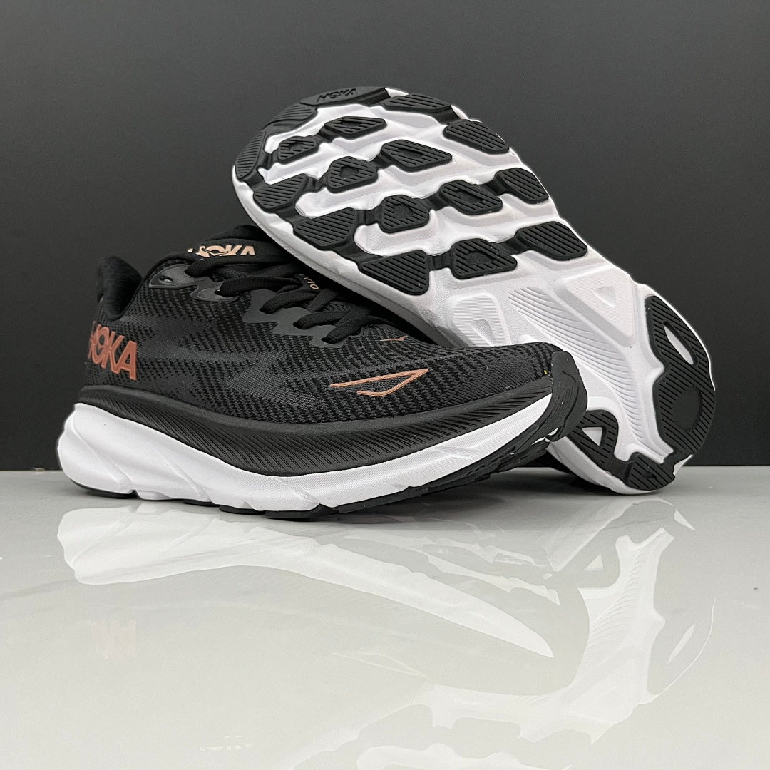HOKA Clifton 9 Running Shoes in Black and Gold - product image from the listing.