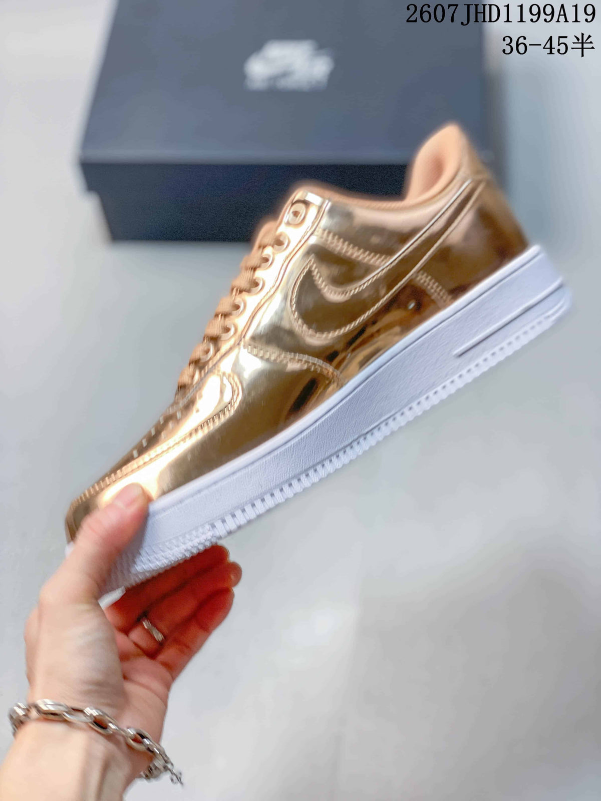 Nike Air Force 1 '07 Low Sneakers in Metallic Gold - product image from the listing.