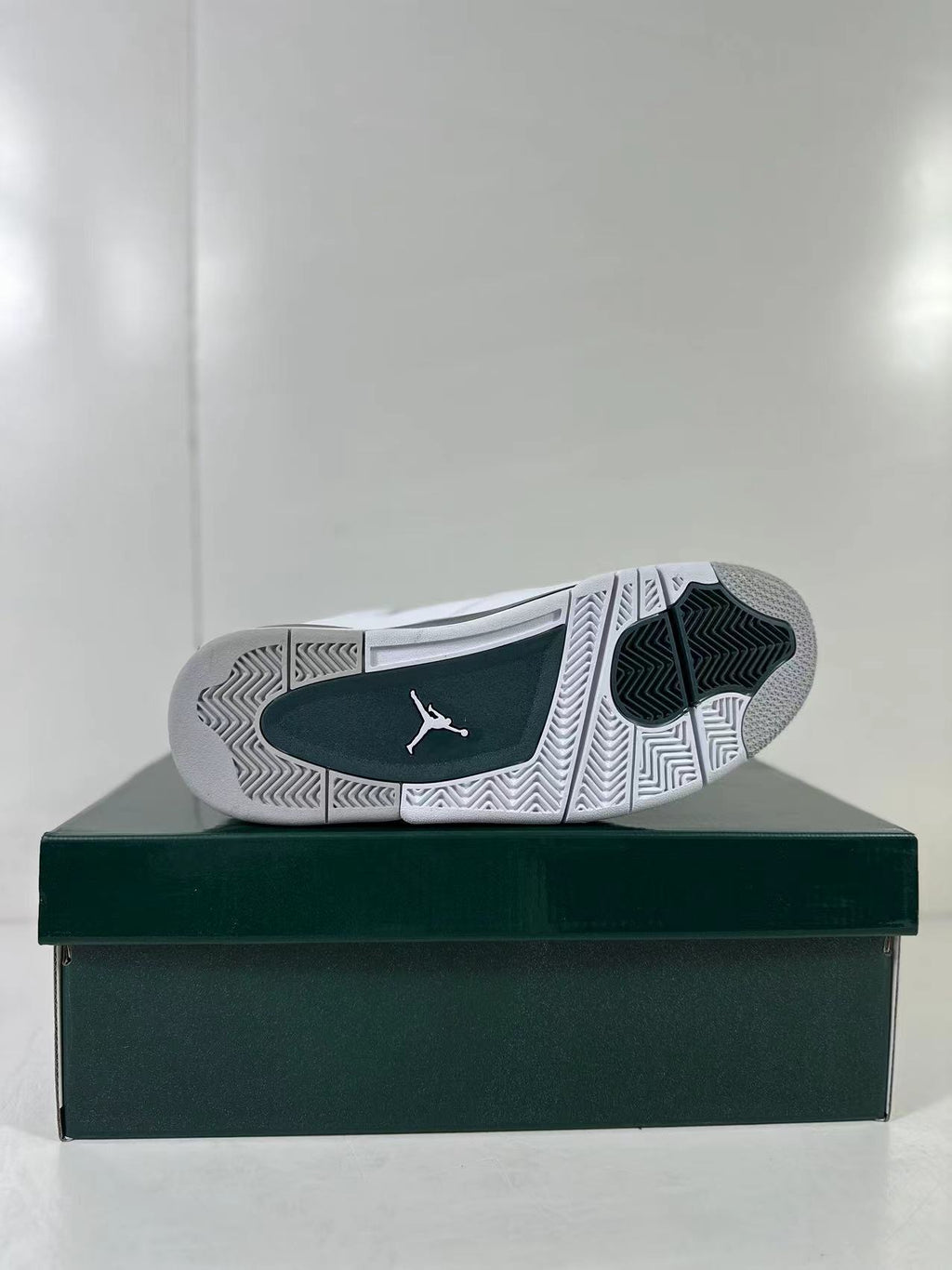 Air Jordan 4 Retro Bucks White Green Sneakers FQ8138-103 - product image from the listing.