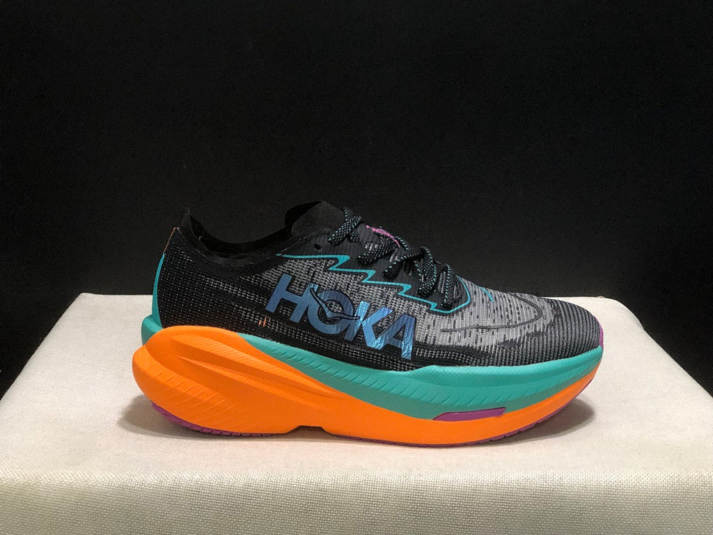 HOKA Mach X 2 Running Shoes, in Black and Turquoise - product image from the listing.