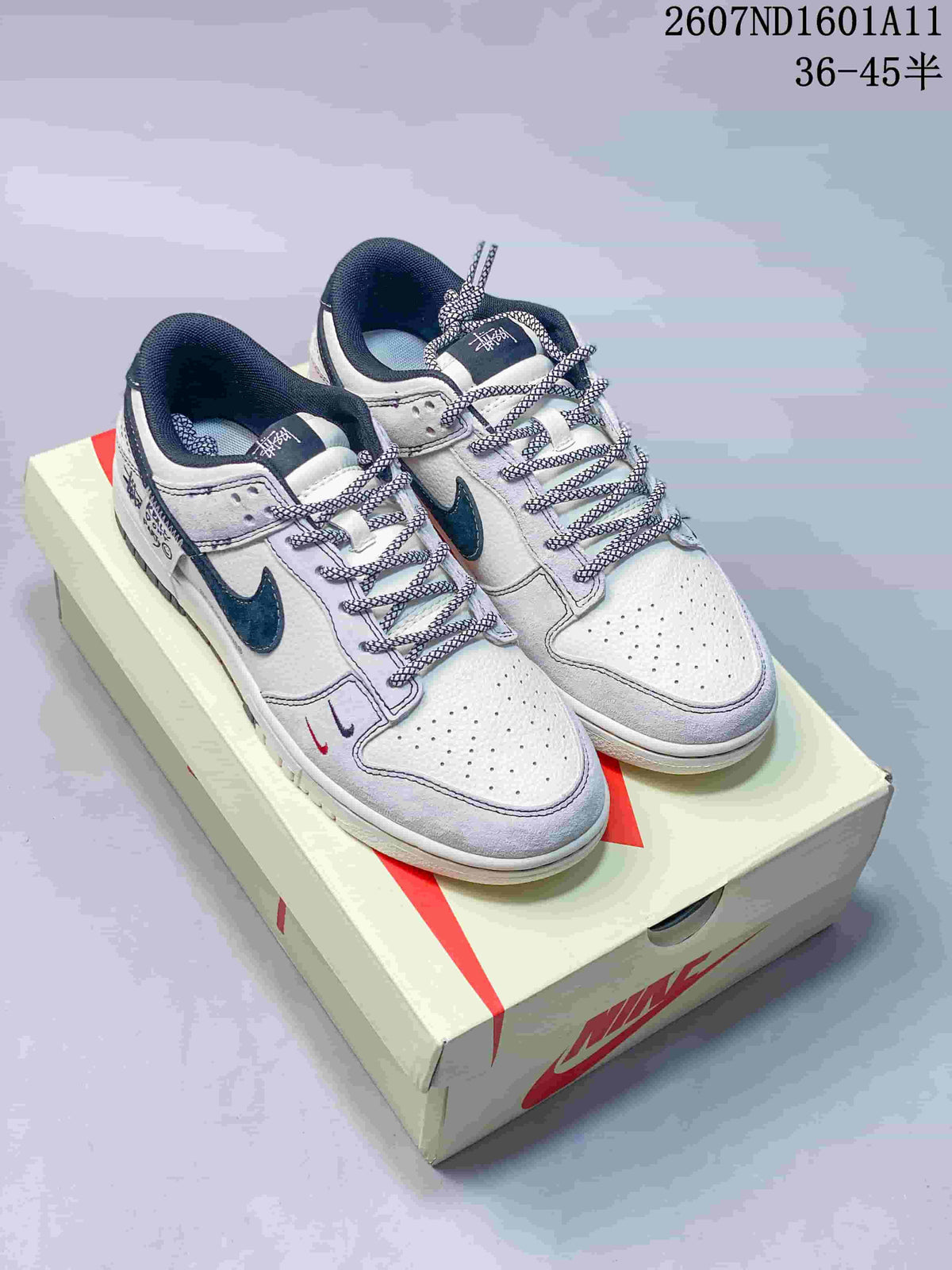 Nike SB Dunk Low Sneakers in Off-White White Navy 2607ND1601A11 - product image from the listing.