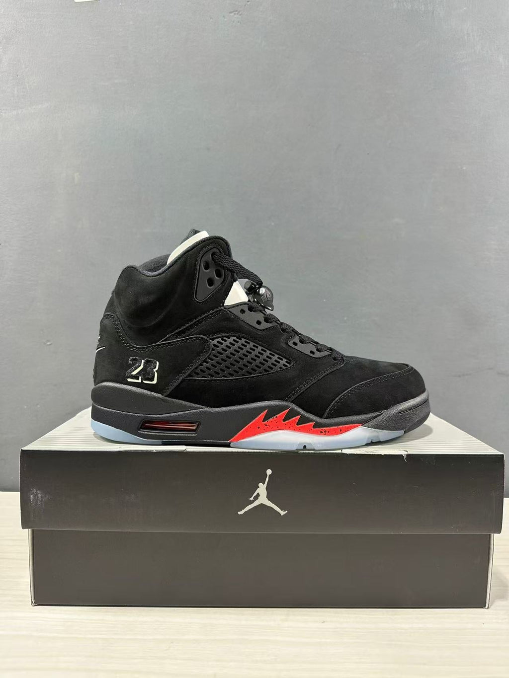 Air Jordan 5 Retro Sneakers Black and Red - product image from the listing.